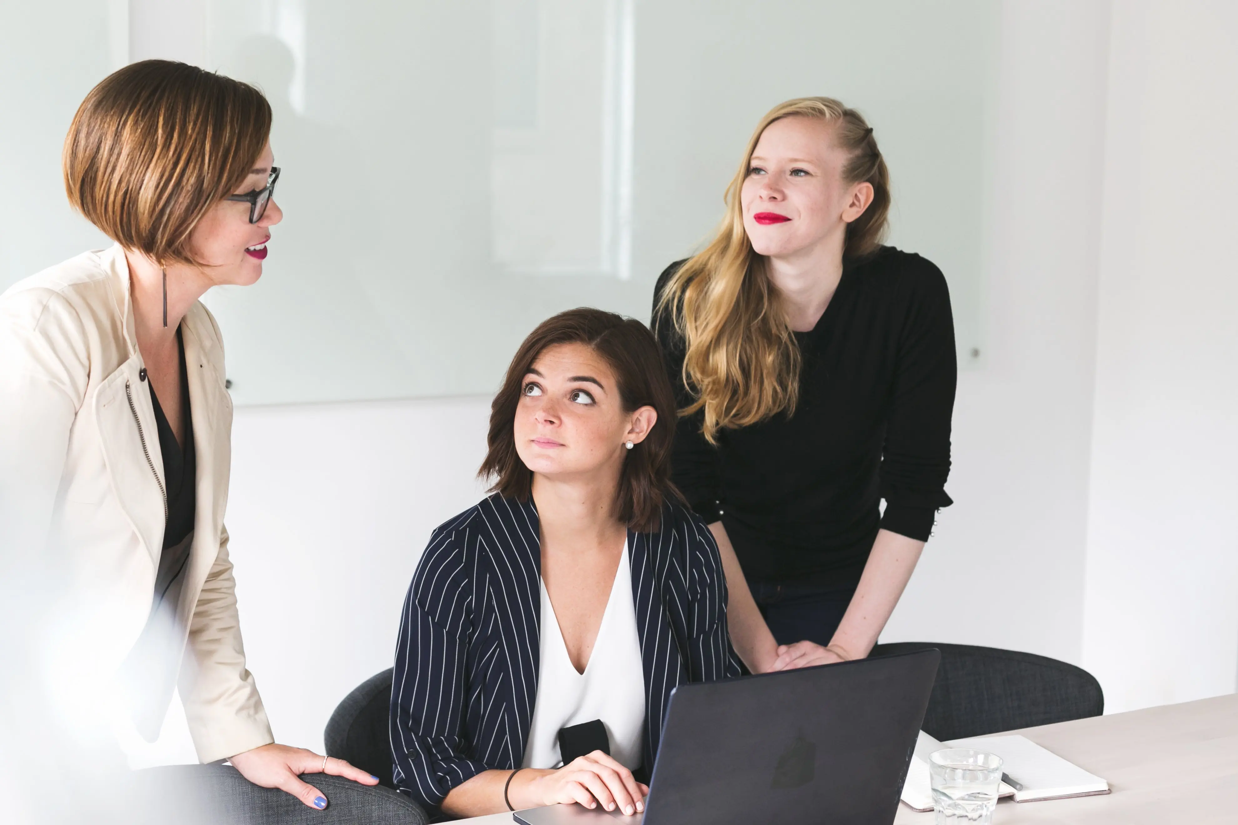 three-business-women women-in-tech